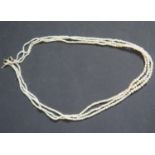 A Three Strand Pearl Necklace