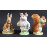 Three Beswick Beatrix Potter Figures: Squirrel Nutkin, Little Pig Robinson and Benjamin Bunny
