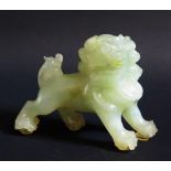 A Chinese Carved Jade Lion, 10.5cm long