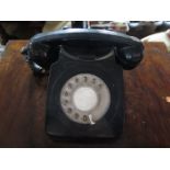A Black Plastic Model 746 Telephone