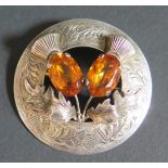 An Early Elizabeth II Scottish Silver and Citrine Mounted Thistle Brooch with chased decoration,