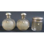 A Pair of Edward VII Art Nouveau Scent Bottles with slice cut shoulders over three frosted glass