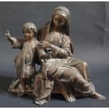 A Patinated Spelter Sculpture of Madonna with Jesus, 24cm high