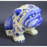 A Chinese Porcelain French Bulldog with foliate decoration
