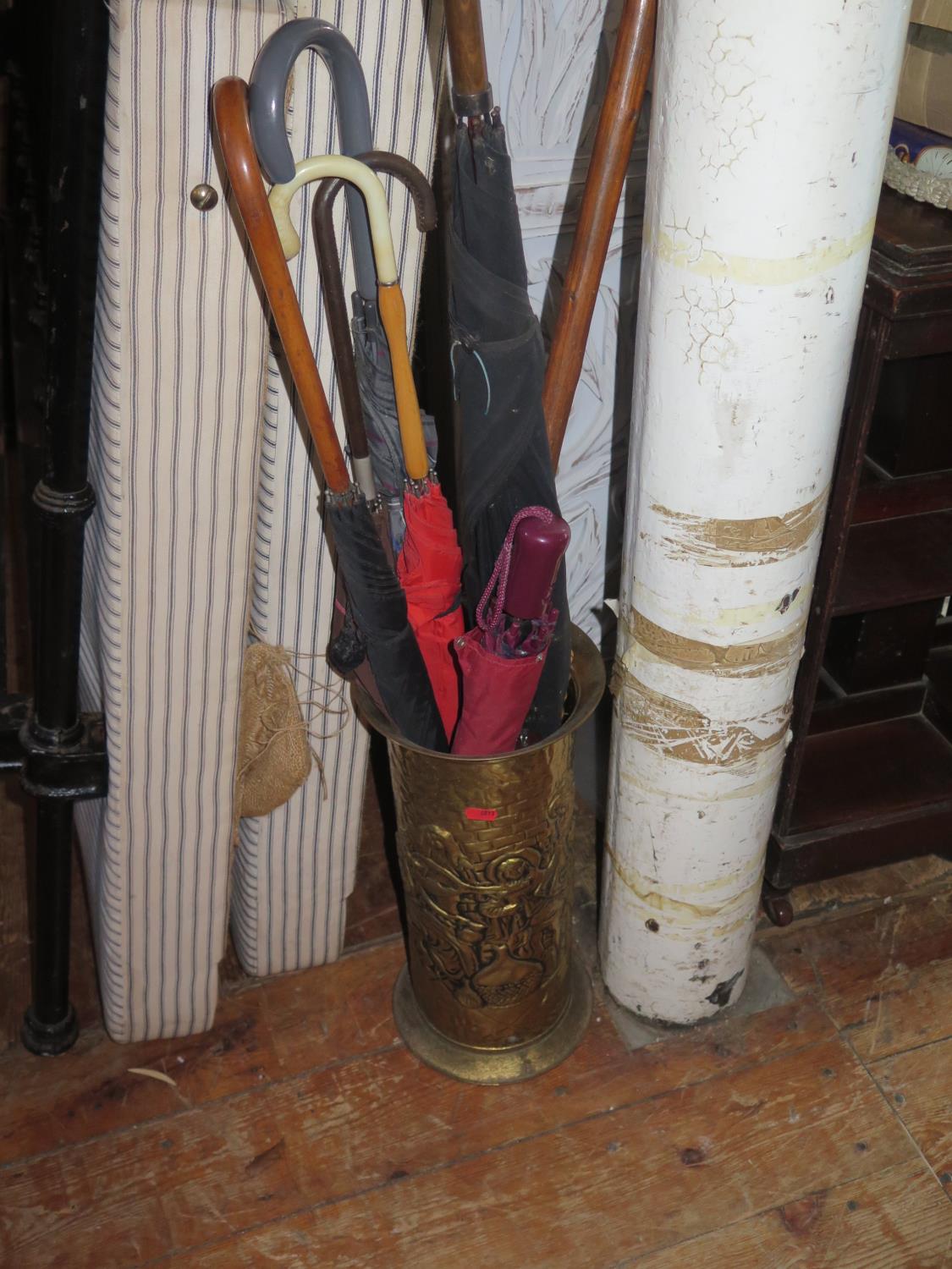 A Brass Stick Stand and Contents