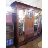 A Large Edwardian red Walnut Mirrored Wardrobe with three central drawers, 200(w)x215(h)x64(d)cm