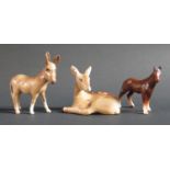 A Beswick Donkey and two others