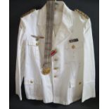 A WWII German Kriegsmarine Admiral's Summer White Jacket with belt and awards