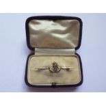 A 9ct Gold and Enamel Royal Navy Brooch in plush case, 3.1g