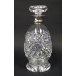 A George V Silver Collared Cut Crystal decanter, Birmingham 1928, Hukin & Heath Ltd.