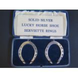 A Cased Pair of Sheffield Silver Lucky Horse Shoe Serviette Rings, H. Hunt, 67g