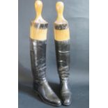 A Pair of Leather Riding Boots with trees