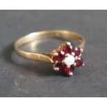 A 9ct Gold, Opal and Garnet Cluster Ring, size Q, 1.7g