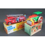 A China Tinplate MF 718 Fiction Fire Truck Mint/near mint in box and Strassenwalze VEB Spielwaren