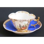 An Augustus Rex Teacup and Saucer