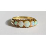 A Victorian 18ct Gold and Opal Five Stone Ring, Chester 1899, size P, 3.7g