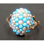 A Victorian Turquoise and Pearl Ring in a 9ct gold setting, size ), 4.5cm