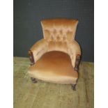 An Edwardian Upholstered Button Back Armchair