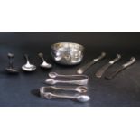 A Selection of Odd Silver Flatware including two pairs of small silver sugar tongs, three spoons and