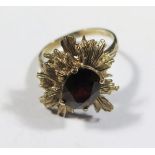 A 1970's 9ct Gold and Garnet Dress Ring, size N.5, 4.8g