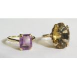 A 9ct Gold and Smokey Quartz Dress Ring (size G) and 9ct and Amethyst Dress Ring (size Q), 7.6g