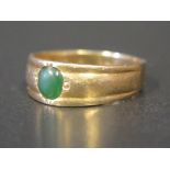 A Green Stone Mounted Ring in unmarked gold setting, 3.6g SOLD ON BEHALF OF HOSPISCARE