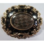 A Victorian Unmarked Gold Backed and Enamel Memorial Brooch set with platted hair panel, 44x36mm,