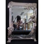 'The First Cuckoo' _ A W.M.F. Silvered German Art Nouveau Easel Back Toilet Mirror decorated with