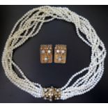 A Silver Gilt Mounted Moonstone Multi-strand Necklace with matching clip earrings