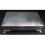 A George VI Silver Cigarette Box with engine turned decoration and heavy gauge hinged lid,