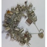 A Heavy Silver Charm Bracelet, 178.7g