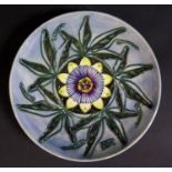 A Modern Moorcroft Limited Edition 1992 Year Plate decorated with passion flower, 174/500, 22cm