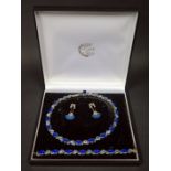 A Sterling Silver, Lapis Lazuli and Blue Stone Mounted Necklace with matching bracelet, necklace
