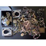 A Selection of Costume Jewellery including simulated pearl necklaces, brooches etc.