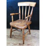 A Child's Elm Seated Spindle Back Carver Chair. A/F