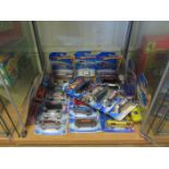A Collection of Carded Hot Wheels Toy Cars