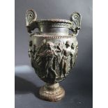 A Victorian Antiquarian Style Bronze Urn decorated with figures with traces of gilding, 22.5cm high
