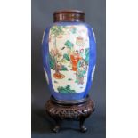 A Nineteenth Century Chinese Famille Verte Vase decorated with two panels of Eminent Figures on a