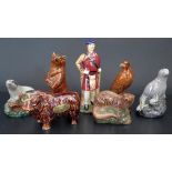 A Collection of Beneagles and Rutherford's Scotch Whisky in Beswick Figurine Decanters (badger