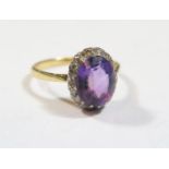 An 18ct Yellow Gold, Amethyst and Diamond Ring, size O, 3.1g