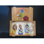Polonaise Collection of Blown Glass Ornaments of Dorothy, Lion, Tin Man and Scarecrow in a Wooden