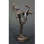 An Indian Bronze Figure of Hindu Figure with raised leg and standing on lotus blossom, 15cm