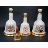 Three Bottles of Commemorative Bell's Scotch Whisky (one empty) plus one miniature.