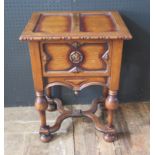 A Carved Oak Sewing Table