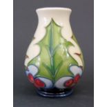 A Modern Moorcroft Holly Decorated Vase by Philip Gibson 2004, 9.5cm, boxed