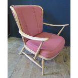 A Light Ercol Open Armchair