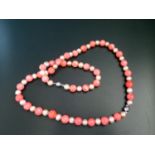 A Cultured Pearl and Coral Necklace with matching bracelet, 79g