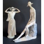 Two Nao Figurines