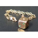 A 9ct Gold Bracelet with Jewel Set Dice Pendant, 6.2g