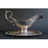 A Peruvian Silver Sauce Boat with integral stand, stamped 'Industria Peruana Plata Esterlina 925